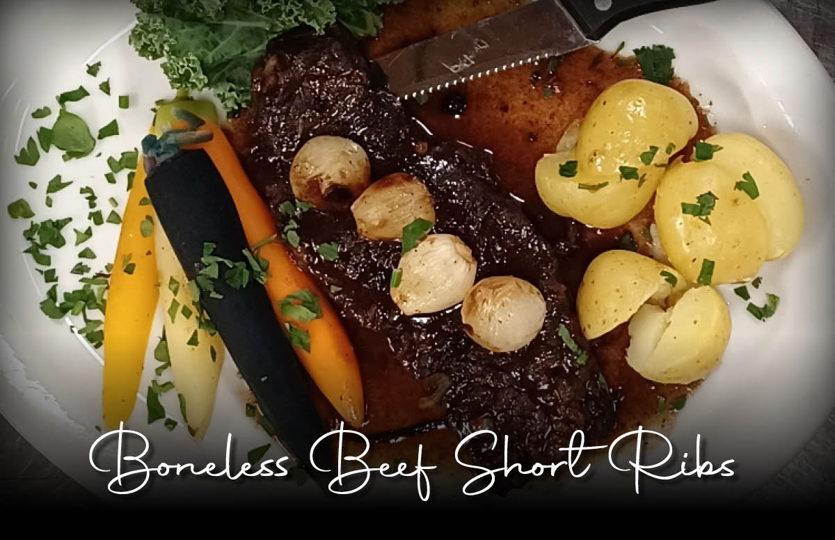 10oz boneless beef short rib slowly braised in red wine and herbs served with tri-colored baby carrots, pearl onions and Yukon gold potatoes.